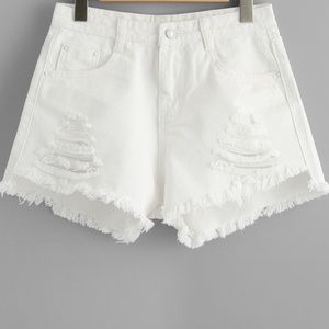 White Ripped Shorts.
